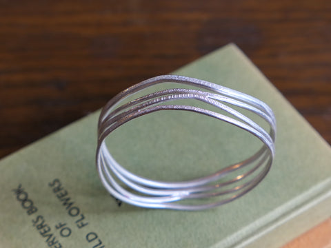 Quadruple Silver Coil Bangle
