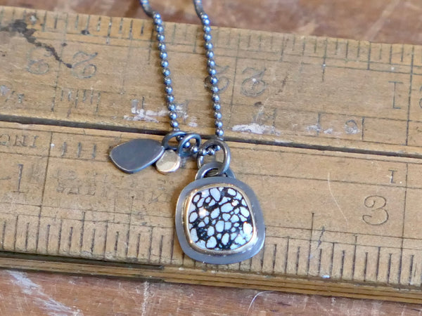 Black and Gold Charm Pendant