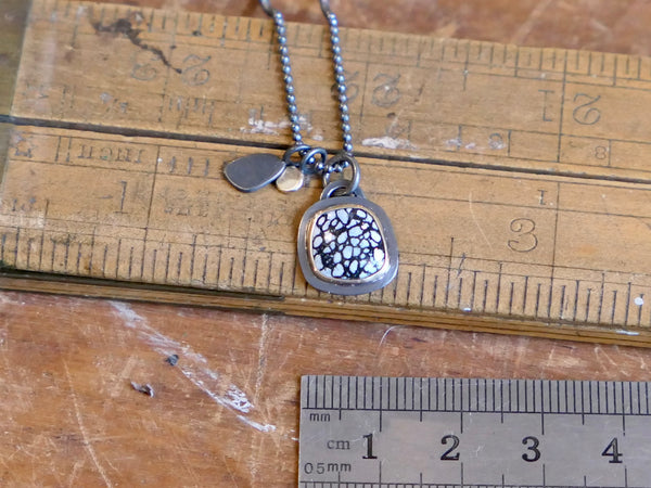 Black and Gold Charm Pendant