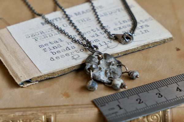 Secrets of the Sandstorm Pendant