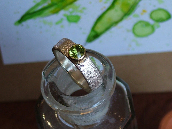 Rivda Ring with Round Checkerboard Cut Peridot