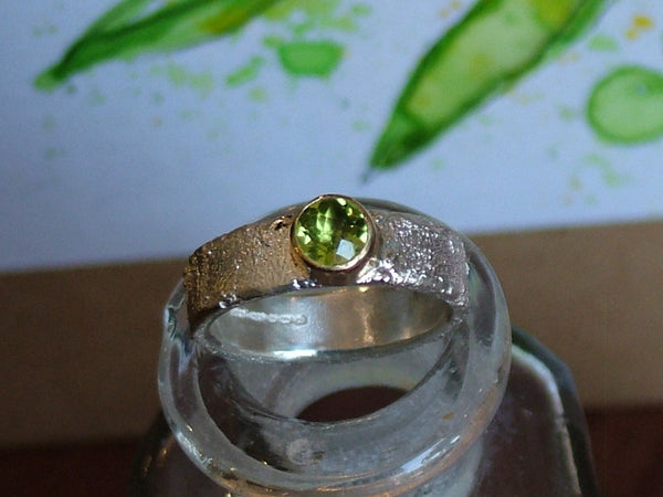 Rivda Ring with Round Checkerboard Cut Peridot